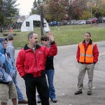 Fred S. Barberra (in jacket) and Daniel A. Endy (in orange vest) lead students on a Valley Crest tour.