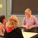 Rosemary D. Neidig talks with college employees Jennifer L. Whitmoyer (left) and Jaimee L. Kopp.