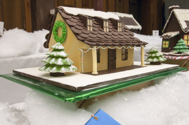 Best of Show was awarded to a “Homey Christmas Cottage” made by Ching Chan.