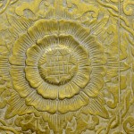 Among the handpicked decor, golden art glistens on the north wall. 