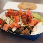 A festive snack begins the college's 100th year.