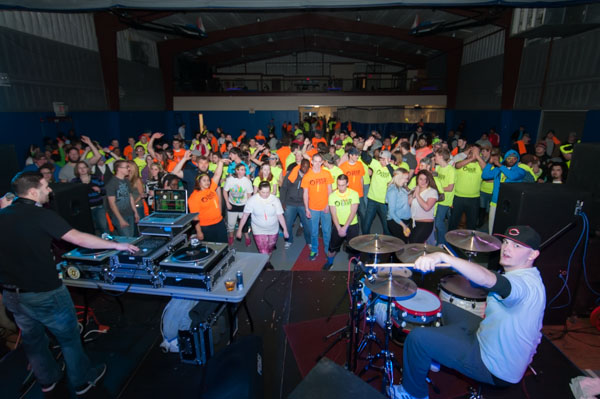 Colorful crowd fills the dance floor