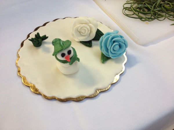 An adorable snowman inside matches the typical Farm Show Week weather outside.