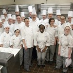 After the final dishes are plated, the “back of the house” gathers for a photo.