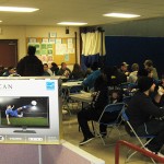 A flat-screen TV, donated by the Residence Life Office, awaits the drawing of the winner's name from among those choosing Seattle as the victor.