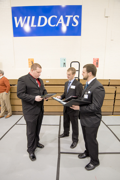 Dressed for success, construction management seniors (from left) Mitchel E. McLaughlin, Lukes D. Coakley and Joshua T. Brem map out Career Fair strategy.