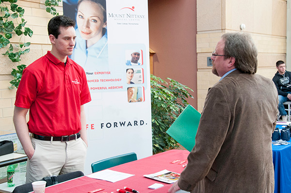 Applied health studies: radiography concentration student Terry M. Conard consults with Drew Brungard of Mount Nittany Health.
