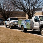 A variety of vehicles surround the ATC on Wednesday, from Landi Renzo's bi-fuel Ford F-550 in the foreground to Brightbill's propane-powered school bus in the distance.