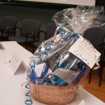 A basket, attractively and bountifully prepared by the Admissions Office, in unsurprising Wildcat Blue.