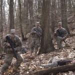Cadets prepare to conduct a search for enemy prisoners of war.