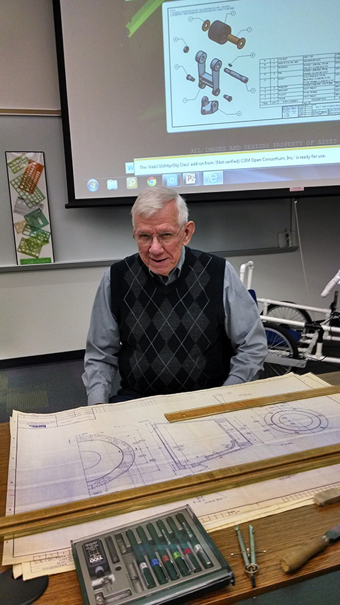 Former instructor and Williamsport Technical Institute alumnus Chalmer C. Van Horn takes visitors back to the pre-CAD days when mechanical drafting meant paper and protractor.