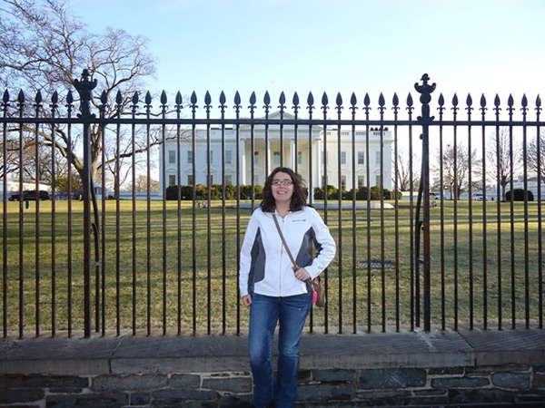 Jessica Reed pauses in front of Pennsylvania Avenue's most famous residence.