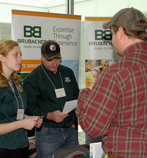 Representatives of Brubacher Excavating Inc. assess a job applicant.