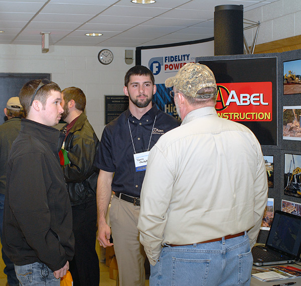 Corvin K. Oberholtzer, a 2012 graduate in residential construction technology and management, scouts at the ESC for Abel Construction  Co. Inc.