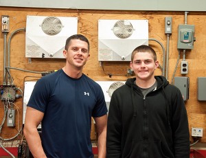 Scholarship recipients Jeffrey C. Comitz, of Hughesville (left), and Michael J. Boylston, of Carmel, N.Y., during a refrigeration class in Penn College’s Carl Building Technologies Center.