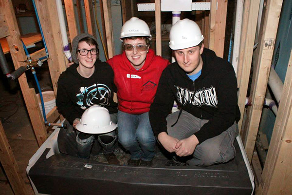 From left, Bethany M. Reppert,  Taylor R. Lapointe and Joseph W. Bourgart oblige a photographer.