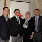 President Davie Jane Gilmour joins (from left) Thomas P. Veres, of Scarsdale, N.Y.; Leonardo Tejeda, of New Rochelle, N.Y.; and Anthony V. Rode, of Lords Valley; prior to Friday's Red Cross Heroes Breakfast at The Genetti Hotel.