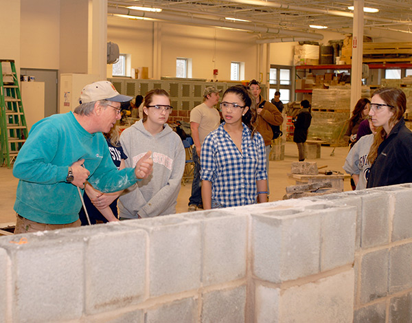 Construction technology instructor Robert P. Gresko shares his knowledge with visiting Penn State students.