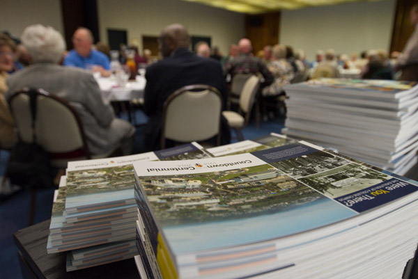 WTI alumni received Centennial books as gifts.