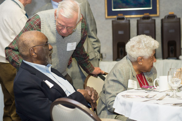 Marcus Hodge, a 1959 graduate in structural drafting, who enjoyed a long career in PennDOT's bridge division, converses with Chalmer Van Horn ('58, mechanical drafting), who was applauded for establishing two scholarship funds at the college. Hodge attended with his wife, Ruth.