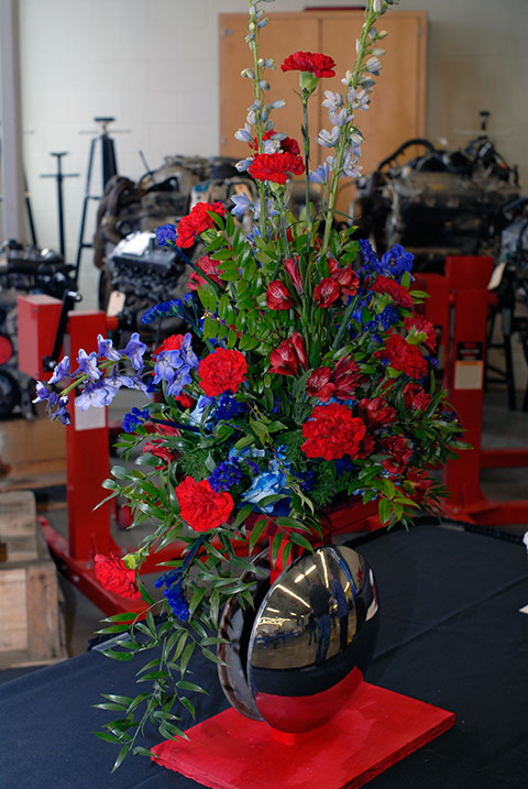 Automotive accessories are cleverly woven into this arrangement created by alumna (and part-time member of the horticulture faculty) Karen R. Ruhl of Special Occasion Florals.