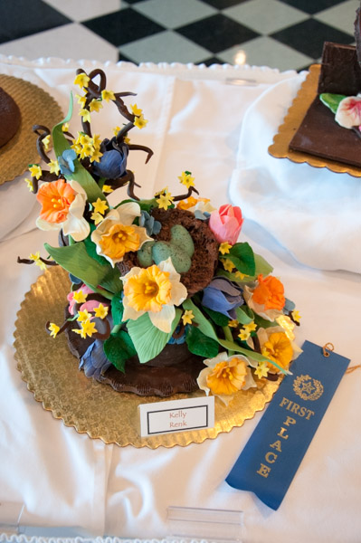 A blooming chocolate centerpiece by Kelly E. Renk, of Cogan Station, takes first place.