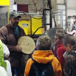 Shane C. Somerville, of Centerville, who will graduate next month with a degree in forest technology, leads a sawmill tour.