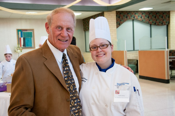 David L. Stroehmann with baking and pastry arts student Heather M. Bakley, a recipient of the D.L. Stroehmann culinary scholarship and a participant in the Grand Pastry Buffet