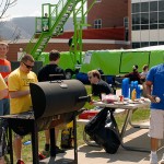 Leftovers from Thursday's Grillin' With the Greeks are put to good use by Sigma Nu’s chef du jour Christopher M. Scheller and other fraternity members.