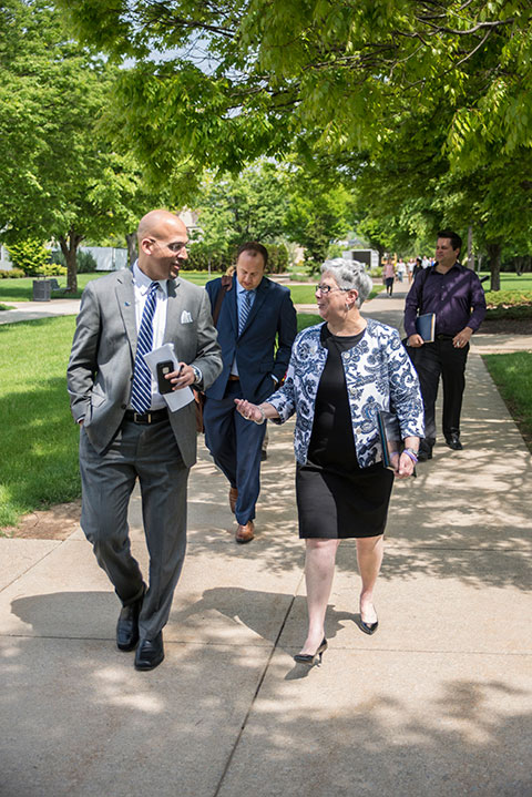 Penn State football coach James Franklin and Penn College President Davie Jane Gilmour get acquainted during the walk from the PDC to the Field House.