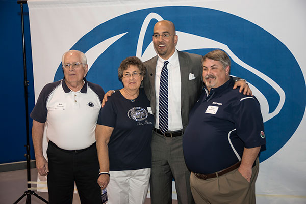 Coach Franklin readily agrees to fans' photo requests.