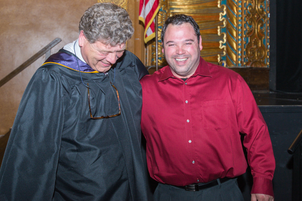 Michels enjoys a hearty laugh with his former dean, Marc E. Bridgens, dean of construction and design technologies. 