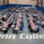 The students and other guests returned to the Field House for lunch atop red-and-white-checked picnic tablecloths.. 
