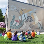 Youngsters visit the Centennial mosaic in progress on a wall of the Physician Assistant Center ...