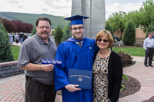 Daniel R. Dietz and family pose in the college's Remembrance Garden. 
