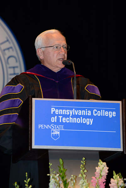 Sen. Gene Yaw, chairman of the Penn College Board of Directors, addresses the commencement crowd.