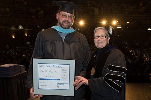 Excellence in Teaching Award recipient Peter B. Kruppenbacher with Penn College President Davie Jane Gilmour