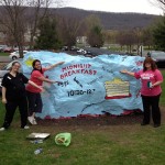 Staff transform "The Rock" into a massive menu, complete with pleasing colors and illustrations of the scrumptious fare in store.