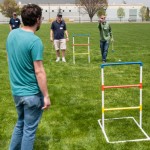 Matt R. Haile, a network specialist in Information Technology Services – and the Wildcats' golf coach – tries his hand in a Ladder Golf match.
