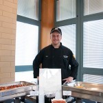 Mike S. Dinan, head cook at the Bush Campus Center, serves as the evening's palate-pleaser.
