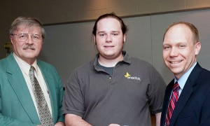 From left: Enactus adviser Dennis R. Williams, recently retired as associate professor of business administration/management; Enactus President Benjamin S. Welch, an information technology: information assurance and security concentration student from State College; and Robb Dietrich, executive director of the Penn College Foundation.