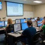 Participants get game-creation guidance from Spyke M. Krepshaw, instructor of computer information technology, and Anita R. Wood, assistant professor of computer information technology ...