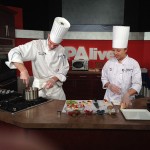 Chef Charles Niedermyer and recent graduate Ching Chan prepare for their live appearance at WBRE’s studios.