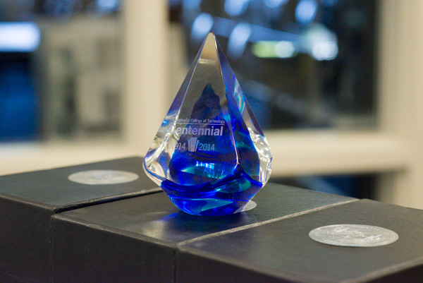 Guests received a stunning piece of Centennial glass artwork when they departed.