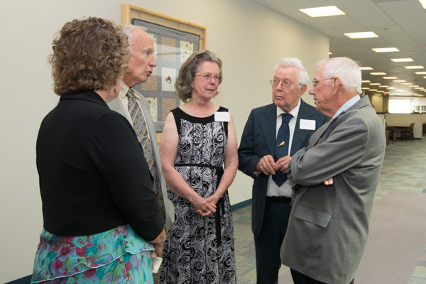 Chalmer C. Van Horn (right) a drafting and CAD technology faculty member from 1962-2005, chats with the family of Kenneth E. Carl, director of the Williamsport Technical Institute from 1952-65 and president of the Williamsport Area Community College from 1965-73. 