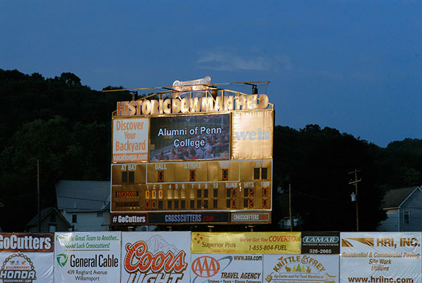 The scoreboard pays tribute to alumni of Penn College ... 