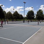 Tennis courts beckon under blue skies.