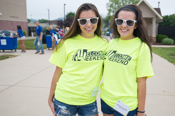 Sporting Penn College sunglasses – the day's must-have accessory – are volunteers Morgan A. Atherton, left, from Newburg, and Britney L. Uroskie, of Pottsville. Both are sophomores in dental hygiene: health policy and administration concentration.