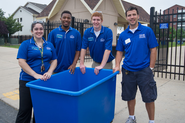 Alumni volunteer David R. Bailey, far right, (’00 architectural technology, and ’11 technology management) joins the Blue-Bin Brigade with resident assistants Alisha M. Miley, a junior in technology management (also a ’13 baking and pastry arts grad) from State College; Calvin L. Holland, a sophomore in plastics and polymer engineering technology from Huntingtown, Maryland, and Daniel M. Trump, a junior in automotive technology management: automotive technology concentration (also a ’14 automotive technology grad), from Spring Grove. Bailey works as a market manager for an innovation group at Construction Specialties Inc., in Muncy.