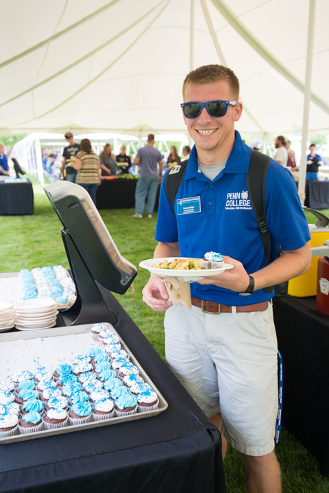 Physician Assistant junior Cavan R. Irvine, of York, takes time for a sweet treat. Irvine worked on campus all summer as a Connections Link.